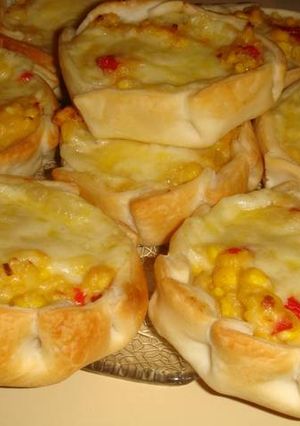 Una foto de Canastitas de choclo y queso 