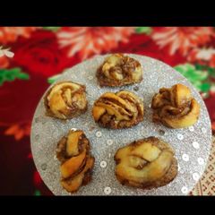 A picture of Cinnamon puff with chocolate touch.