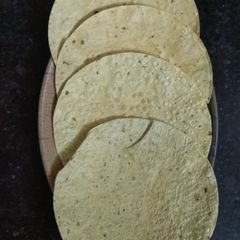 A picture of Roasted Urad Papad In Different Way.