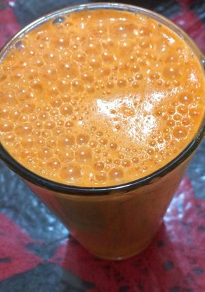 Una foto de Jugo zanahoria y naranja