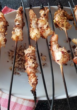 Une photo de Gambas panées aux amandes, noisettes et pistaches