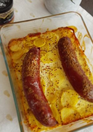 A picture of Dauphinois with Smoked Sausages and Whole Grain Mustard.