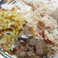 Beef stew rice and fried cabbage A picture of Beef stew rice and fried cabbage.