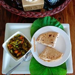 A picture of Kerala style mix veg Korma and roti.