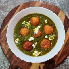 A picture of MALAI KOFTA with SPINACH GRAVY (with fresh cream).