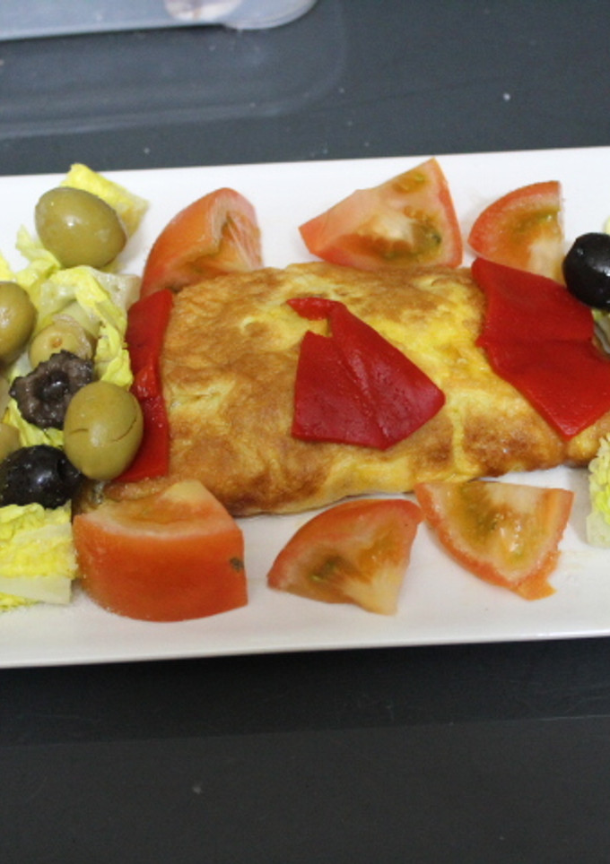Una foto de Redondo de tortilla con verduras