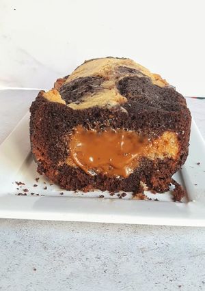Una foto de ❌ BUDÍN MARMOLADO RELLENO DE DULCE DE LECHE‼😱🤤🤤