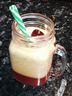 Una foto de Batido de cerezas, melón y naranja