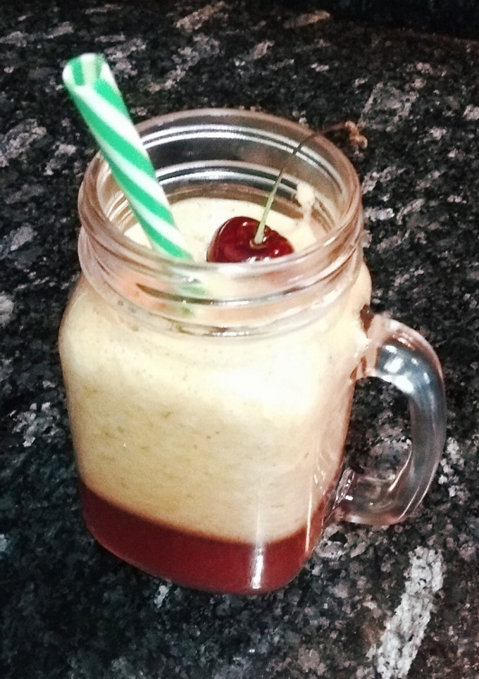 Una foto de Batido de cerezas, melón y naranja