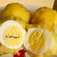 A picture of Egg in potatoes.