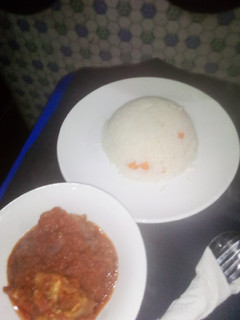 A picture of White rice and stew.