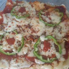 A picture of Creamy and cheesy lasagna.