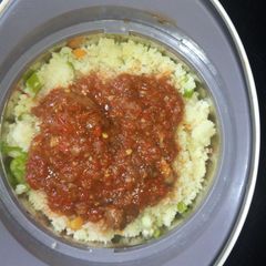 A picture of Couscous with veggies and simple stew.