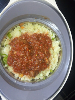 A picture of Couscous with veggies and simple stew.