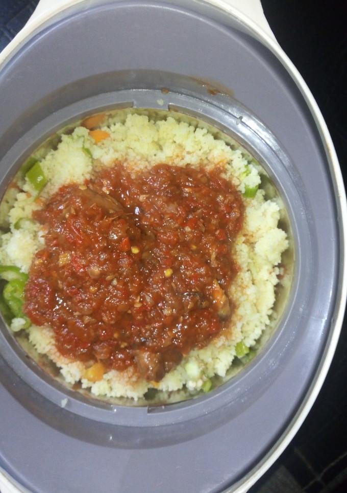 A picture of Couscous with veggies and simple stew.