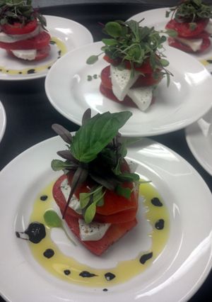 A picture of Roma tomato and mozzarella stacks.