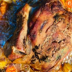 A picture of Delicious leg of lamb.