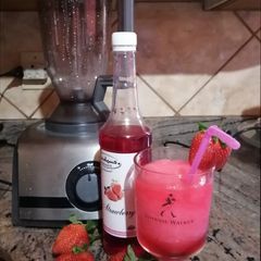 A picture of Strawberry daiquiri 🍓 🍹.