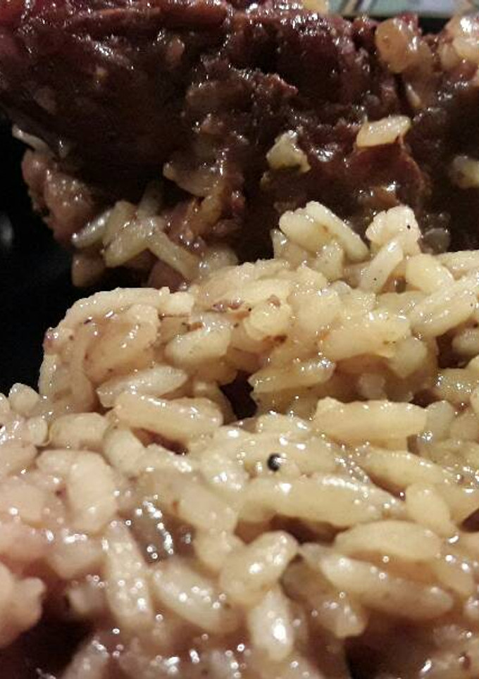 Una foto de Lomo al curry con arroz