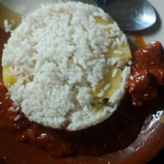 A picture of White rice with boiled irish.