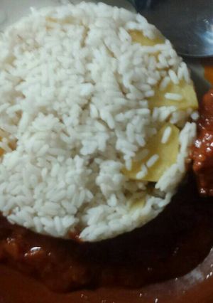 A picture of White rice with boiled irish.