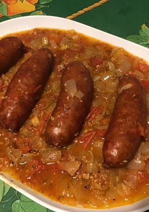 Une photo de Diots du Jura fumés à la compotée de tomates, ail, oignon et origan