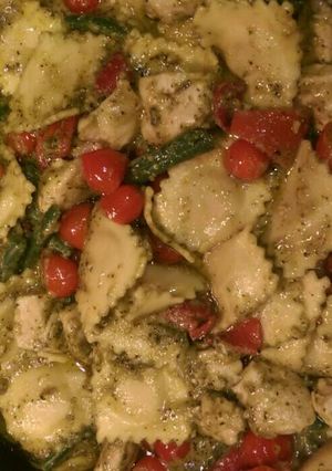 A picture of Roasted red bell pepper and green bean pesto ravioli.
