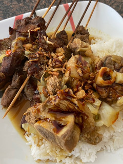 A picture of Lamb kebab with cajun spice.