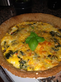 Una foto de Quiche casera de espinacas y setas