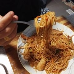 A picture of Crispy chicken spaghetti.