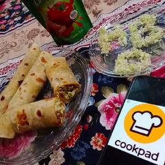 A picture of Chicken tikka mayyo roll(homemade paratha) 😍.