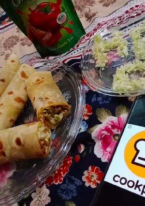 A picture of Chicken tikka mayyo roll(homemade paratha) 😍.