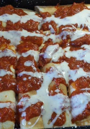Una foto de Canelones de espinaca & pollo y algo más