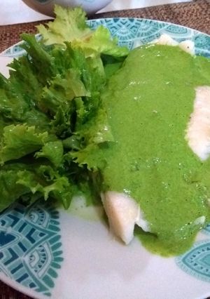 Una foto de Filete de pescado en crema de espinacas