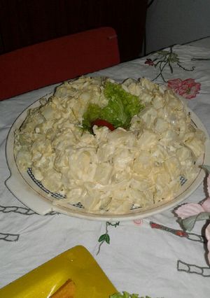 Una foto de Ensalada tipo Alemana de papas, huevo y cebollas blancas
