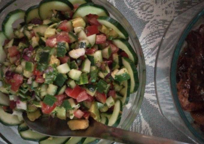 Cucumber, tomatoes, onions, avocado salad