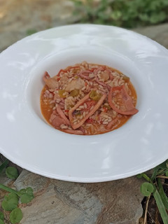 Una foto de Arroz meloso con pota