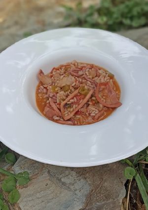 Una foto de Arroz meloso con pota