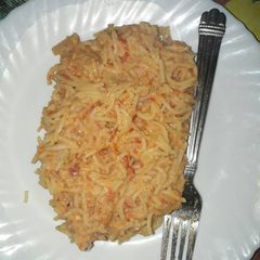 A picture of Fried spaghetti with eggs combo.