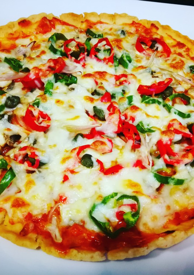 Una foto de Pizza vegetal sin gluten y sin lactosa