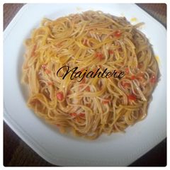 Palm oil jollof spaghetti A picture of Palm oil jollof spaghetti.
