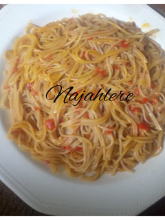 A picture of Palm oil jollof spaghetti.