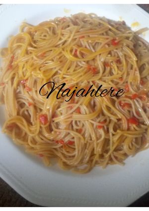 A picture of Palm oil jollof spaghetti.