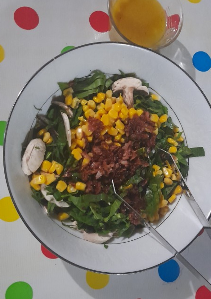 Una foto de Ensalada de espinacas con tocino