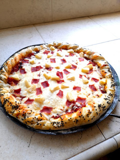 Una foto de Pizza hawaiana