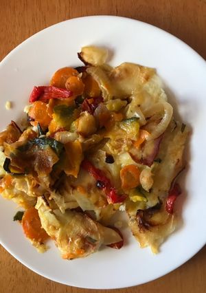 Una foto de Pescado con verduras al horno