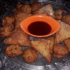 A picture of Macroni samosa & mong daal pakorra.