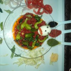 Tomato Cut Hyderabadi dish A picture of Tomato Cut Hyderabadi dish.