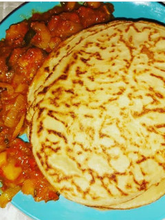 A picture of Savoury pancake with potato sauce.