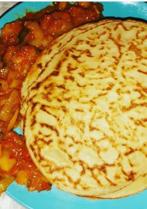 A picture of Savoury pancake with potato sauce.